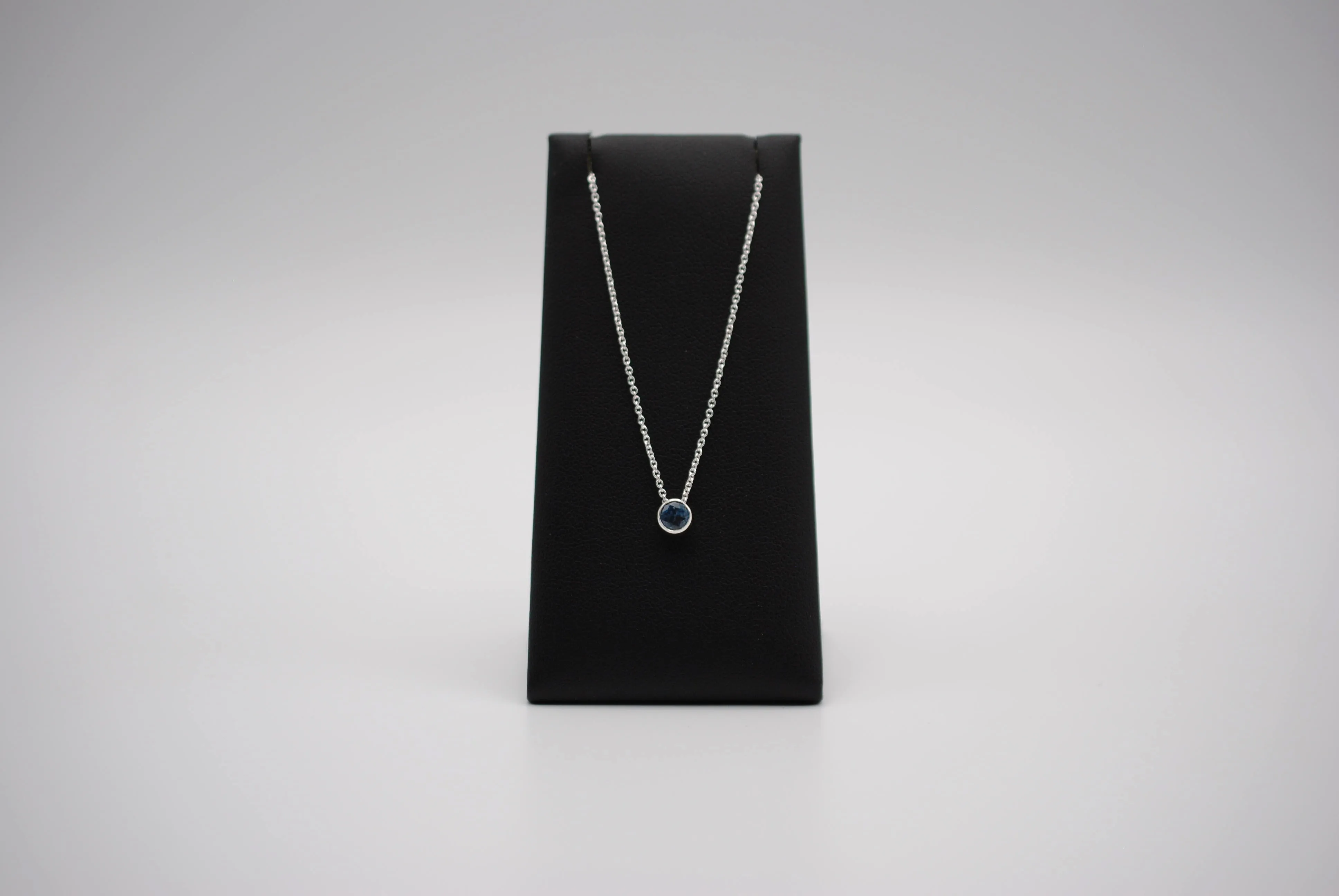 Birthstone Necklace: Round Blue Zircon, Bezel, Silver, Cable Chain