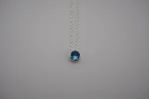 Birthstone Necklace: Round Blue Zircon, Bezel, Silver, Cable Chain