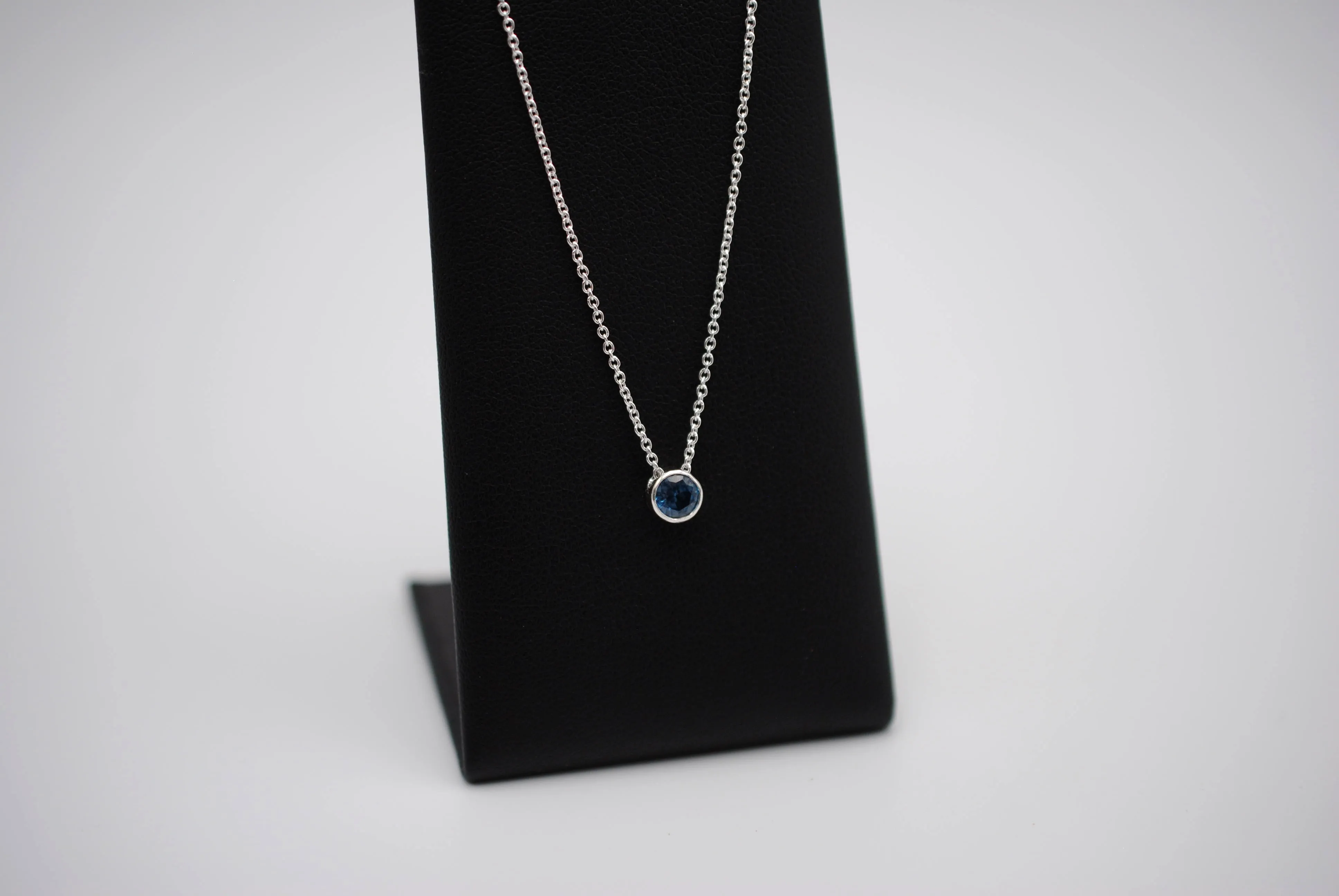 Birthstone Necklace: Round Blue Zircon, Bezel, Silver, Cable Chain