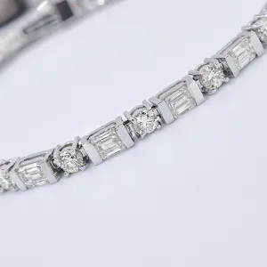 Mesmerizing 6.30CT Emerald and Round Cut Diamond Tennis Bracelet in 18KT White Gold