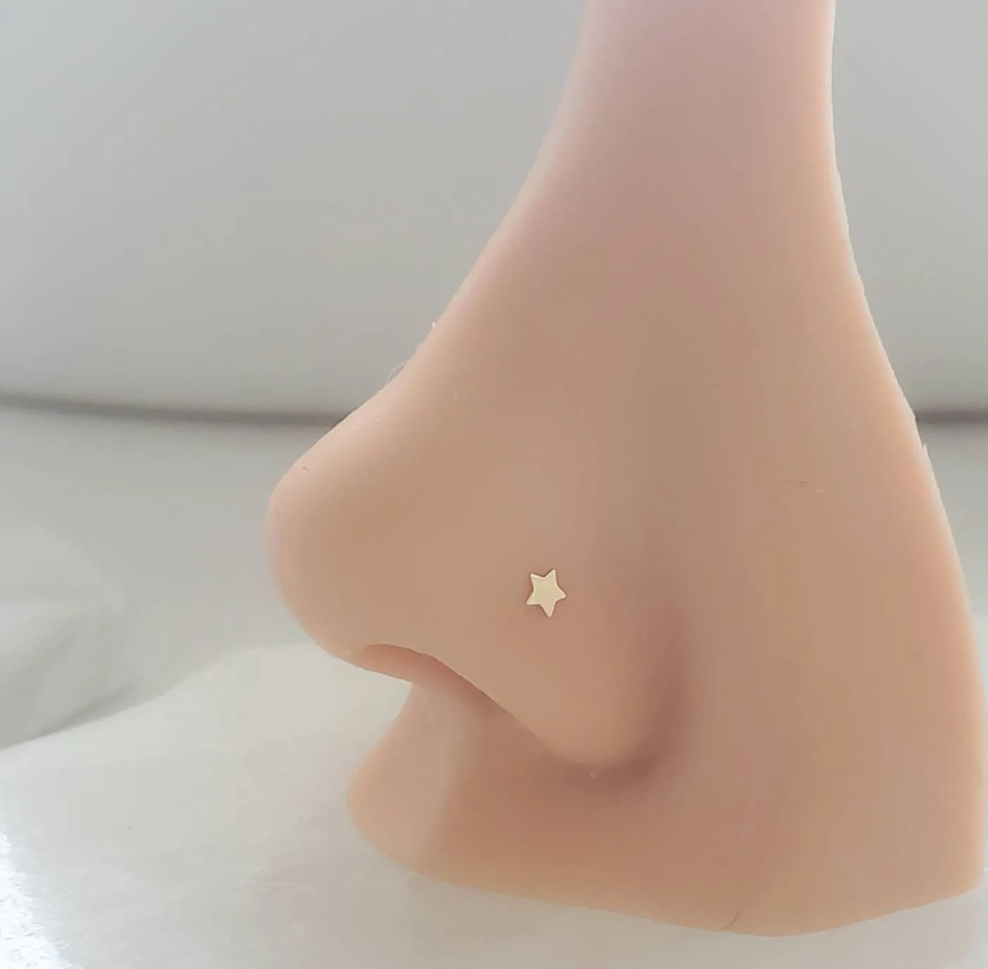 Tiny Star Nose Stud in 14k Gold